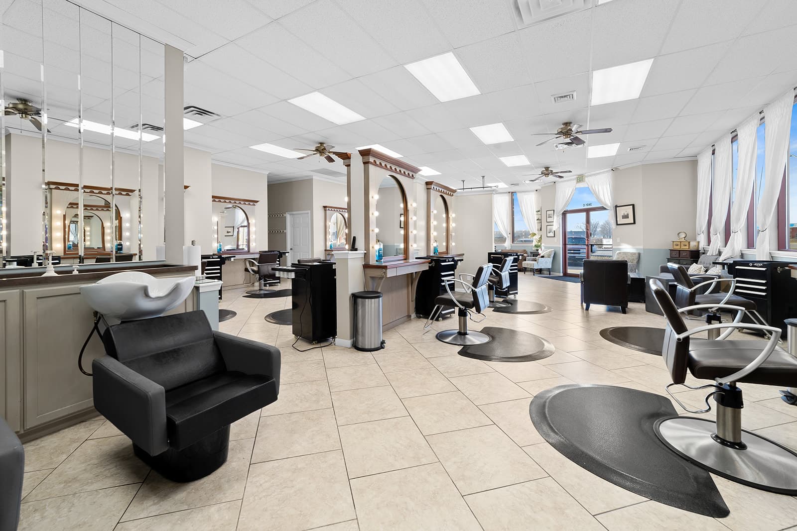Love's Hair & Spa salon interior with styling chairs and mirrors